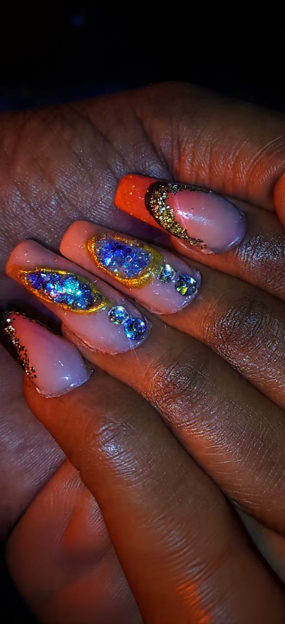 Hand with beautiful pink nails